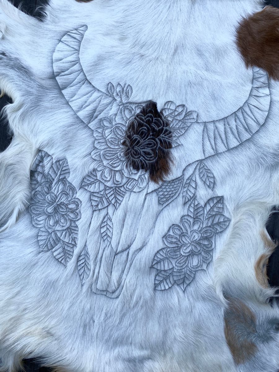 HIDE CARVED BUFFALO RUG Shoe Shu